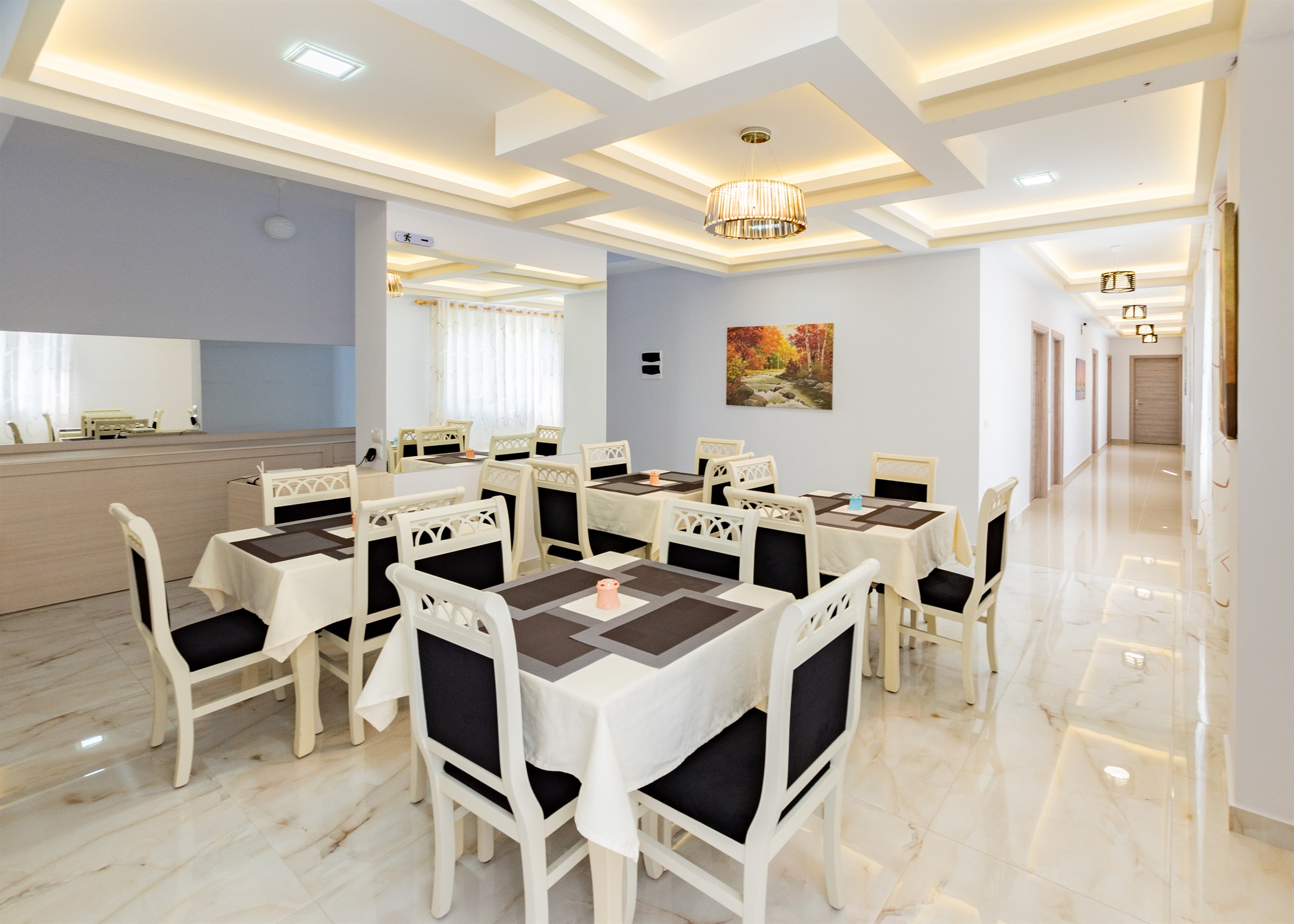 Bright breakfast dining room at The City Gate Hotel