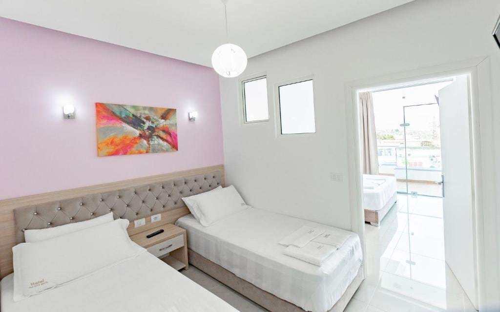 Quadruple Room with Balcony at The City Gate Hotel